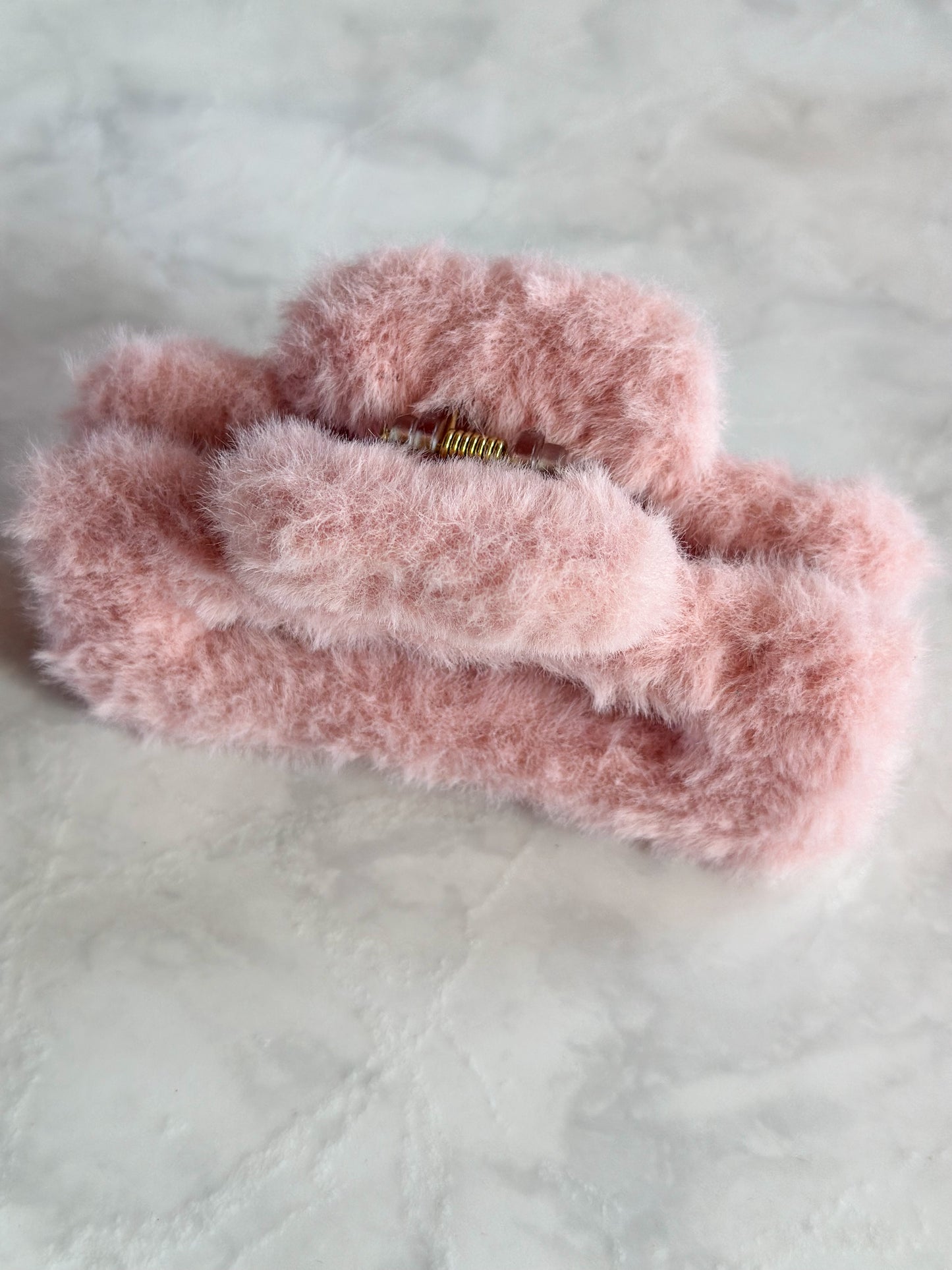 Pinza peluche rosa mediana